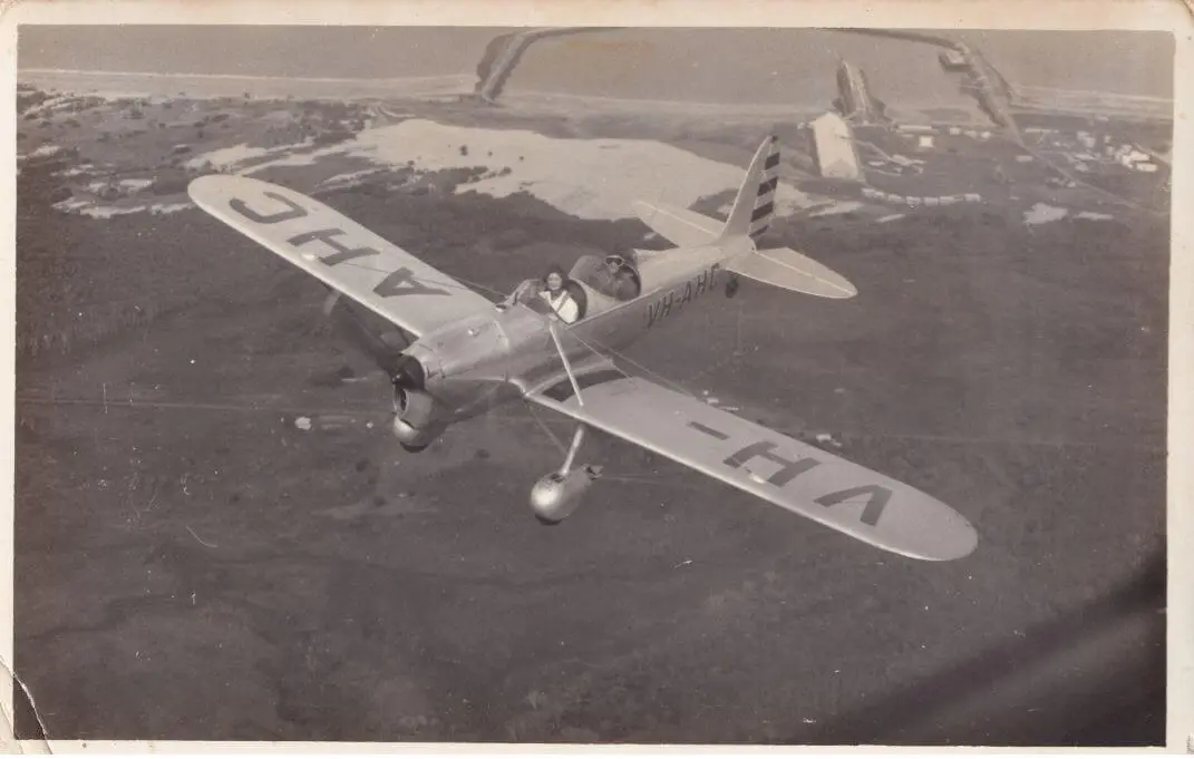 Ryan STM-2 VH-AHC with Mackay Harbour in the background. Year of photo unknown.