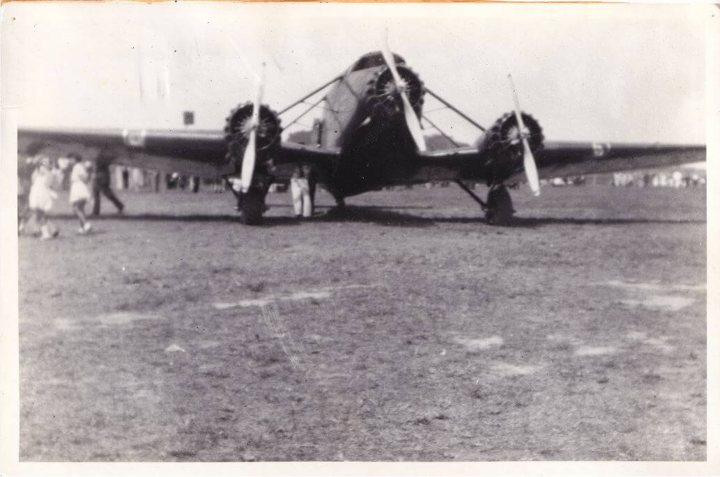 Airlines of Australia Stinson at Mackay. Used on the Brisbane -Townsville service calling into Mackay three times a week.