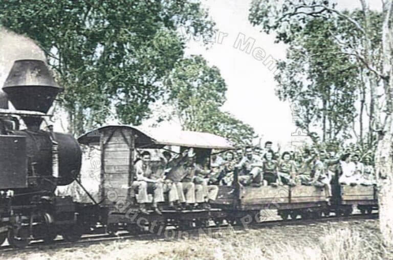 American soldiers enjoy a ride on a cane train in Mackay during an R and R break during B17 Bakers Creek 1943.