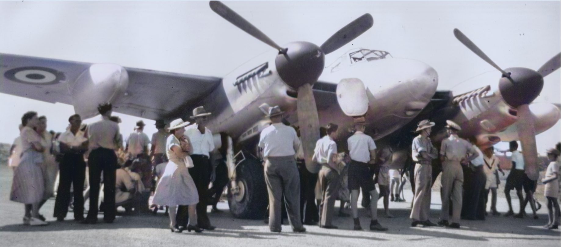 People lining up for a close inspection of the Lincoln. The Mosquito is in the background. - RAAF Recruiting Visit to Mackay – March 1953